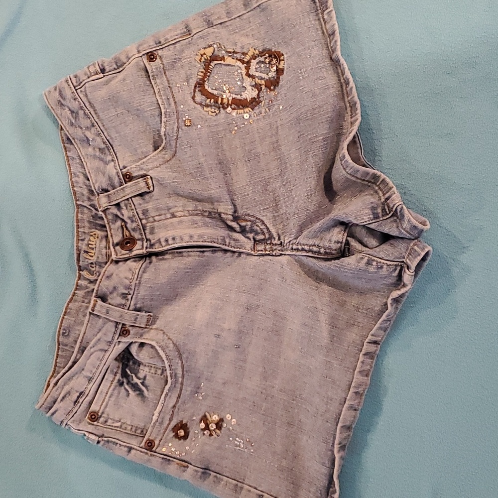 L.A. Blues Denim Shorts Blue with brown/white stitching. Size 8.
